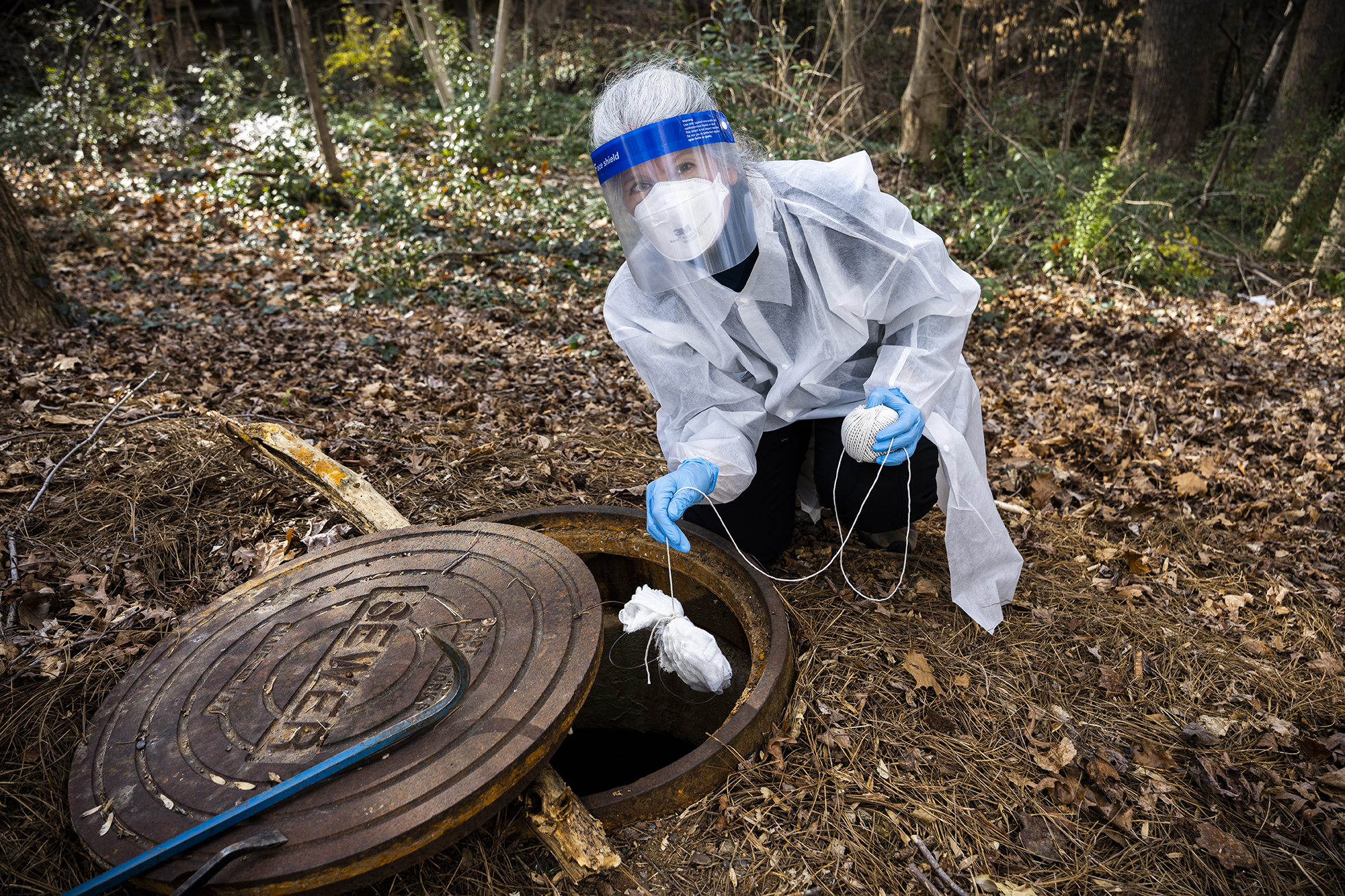 Researcher collecting a sample